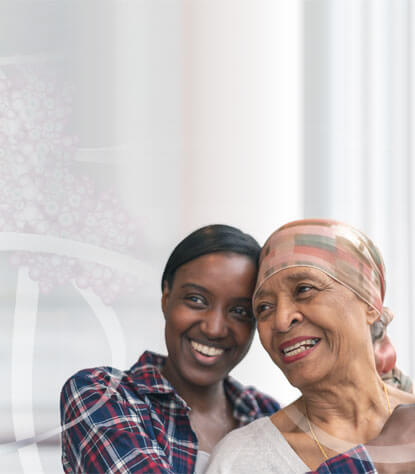 Photo: 2 women in supportive embrace: we are working to make a difference for caregivers of patients w/endocrine rare disease & cancer